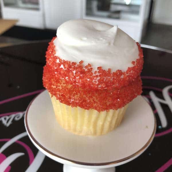 Almond Cupcake with Raspberry Filling & White Buttercream